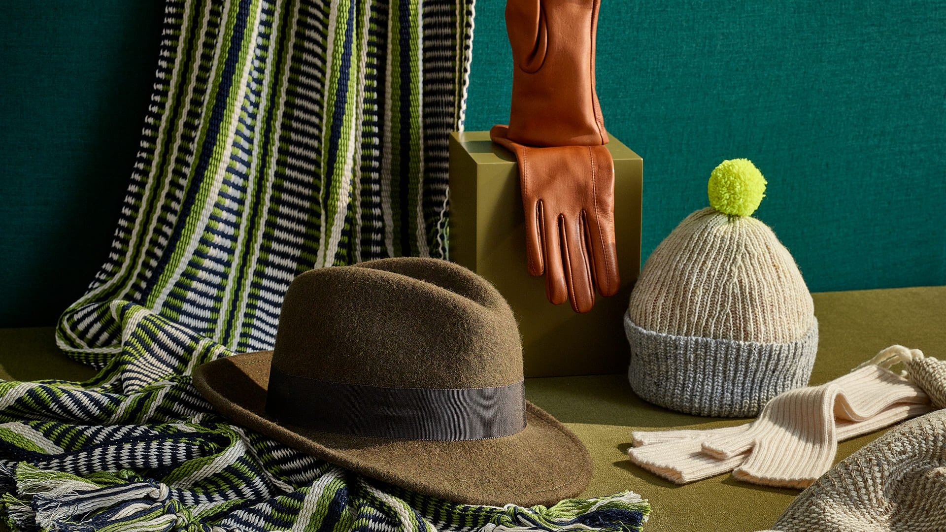 DCCI Made Local presents: Stable of Ireland, Green & Black Long Island Crios Large Scarf. George Horn Ltd, Ladies 2 point leather Havana glove. Pearl Reddington Knitwear, Nu Hata with Neon Pompom. Shevlin Millinery, Chocolate brown wool felt classic trilby with chocolate grosgrain ribbon trim. Ekotree Ltd, 100 % Cashmere Rib Mittens. Hata, The orange/rust tweed scarf. Studio Donegal, The orange/rust tweed scarf. © Trevor Hart